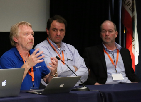 Figure 2. Ivan Seskar (Rutgers) and Jack Brassil (NSF) listen as Jerry Sobieski of NORDUnet describes the GÉANT Testbed Service (GTS) during the "What's the right testbed for your experiment goals?" panel. 